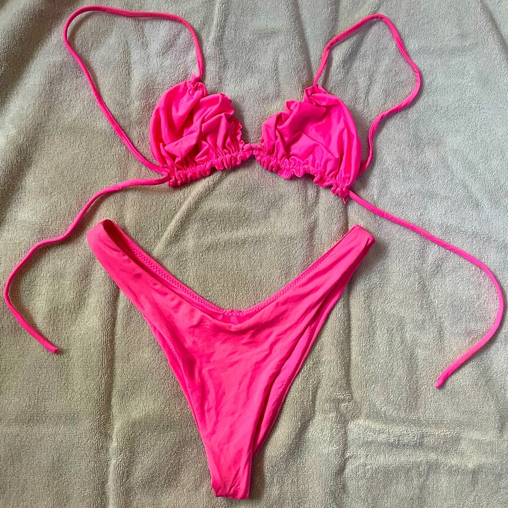 Peixoto neon pink bikini. Ties over the shoulder for an open back look